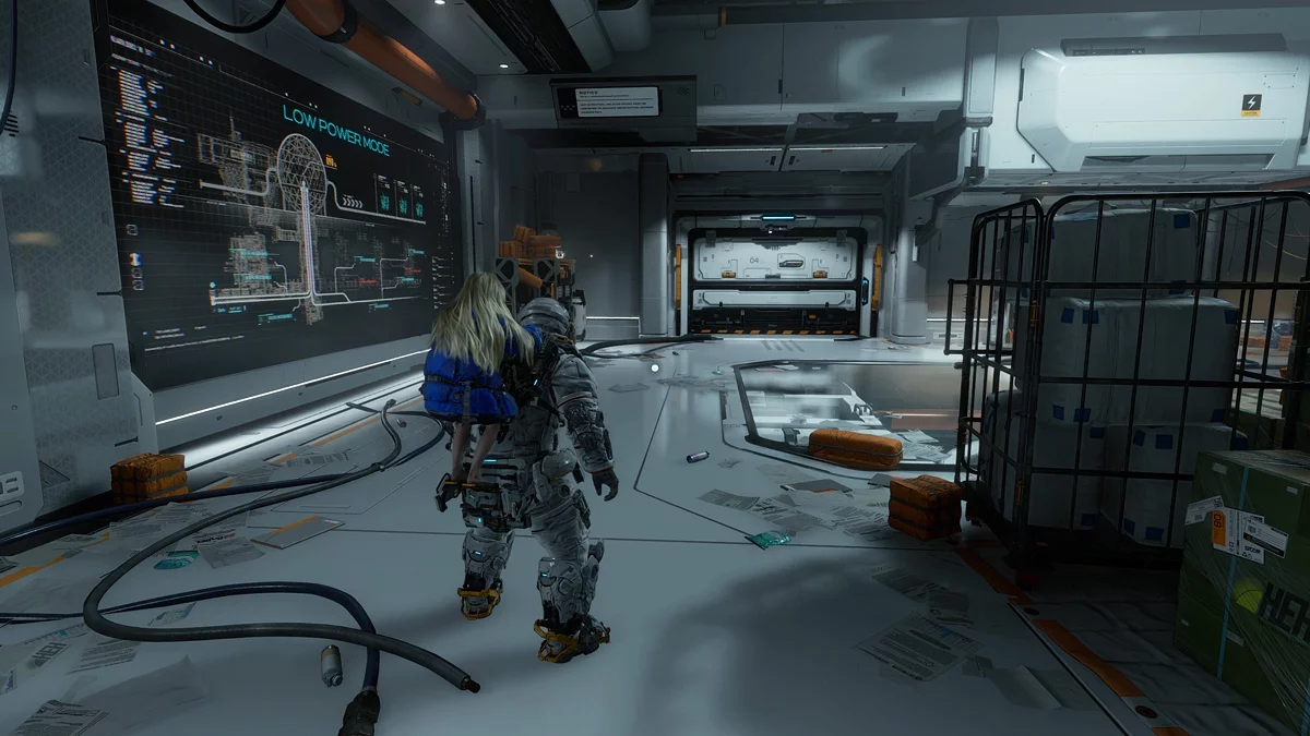 An android will climb out of a capsule as soon as you approach the gate