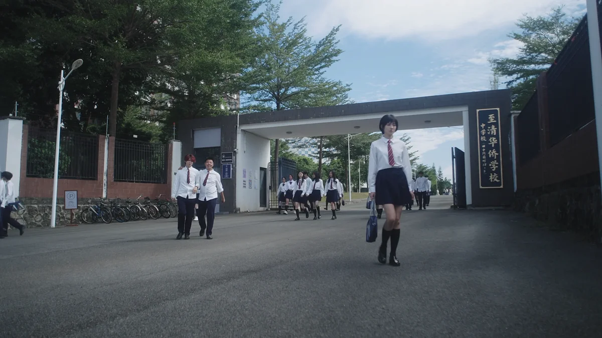 A Chinese school. Everything was shot on location in a real school, with no green screen