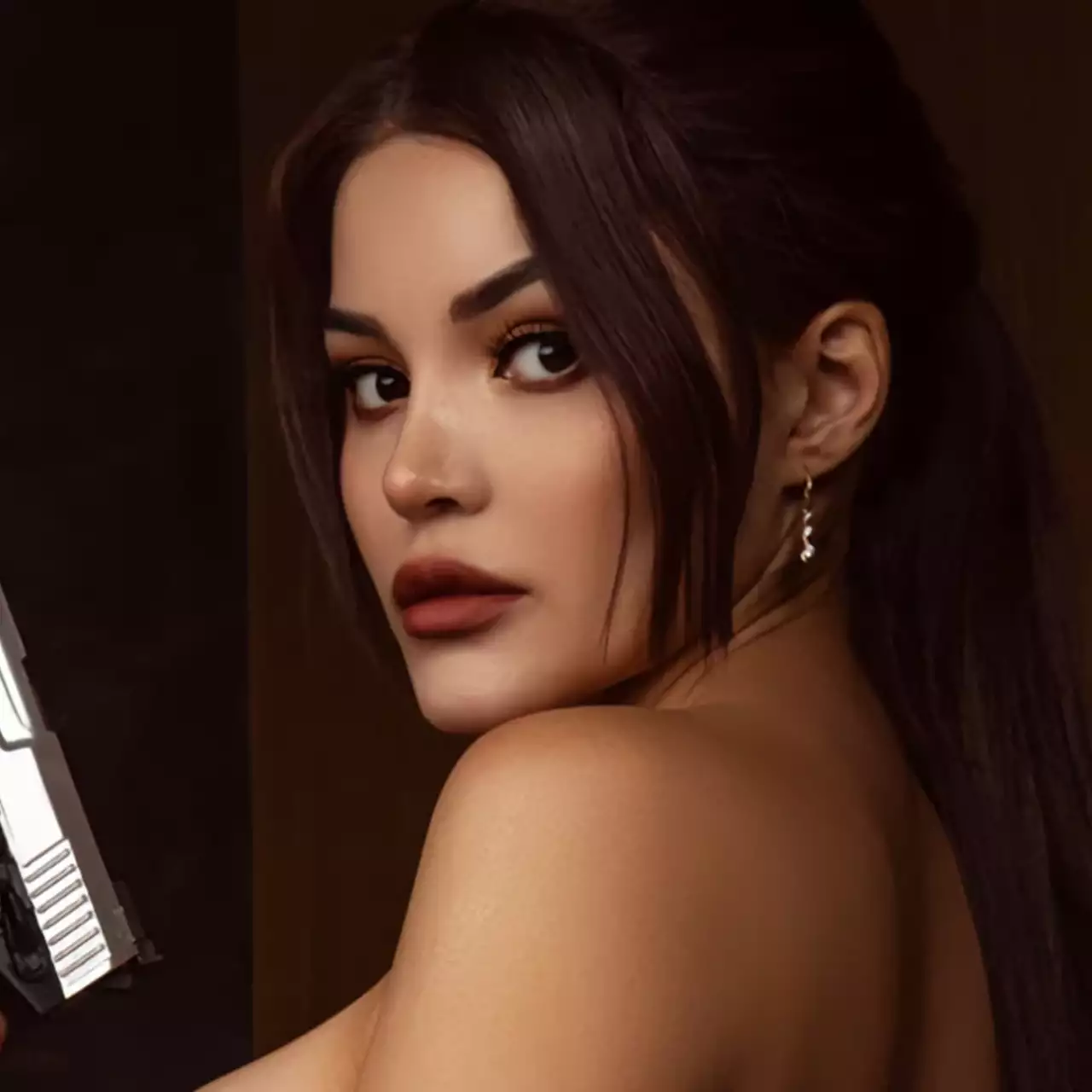 Косплеєрша розділу Лару Крофт з Tomb Raider Косплеєрша розділу Лару Крофт з Tomb Raider